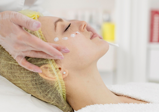 woman beauty clinic face treatment