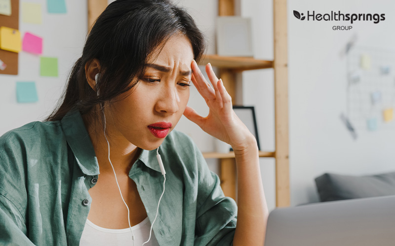 Image of person looking stressed