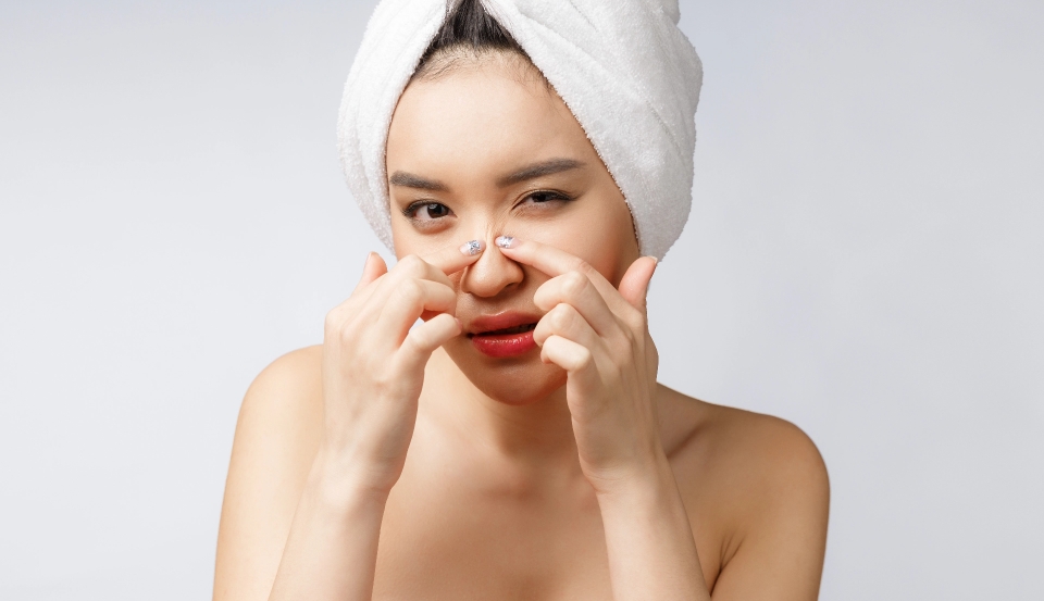 asian woman looking pimple face young woman try remove her pimple